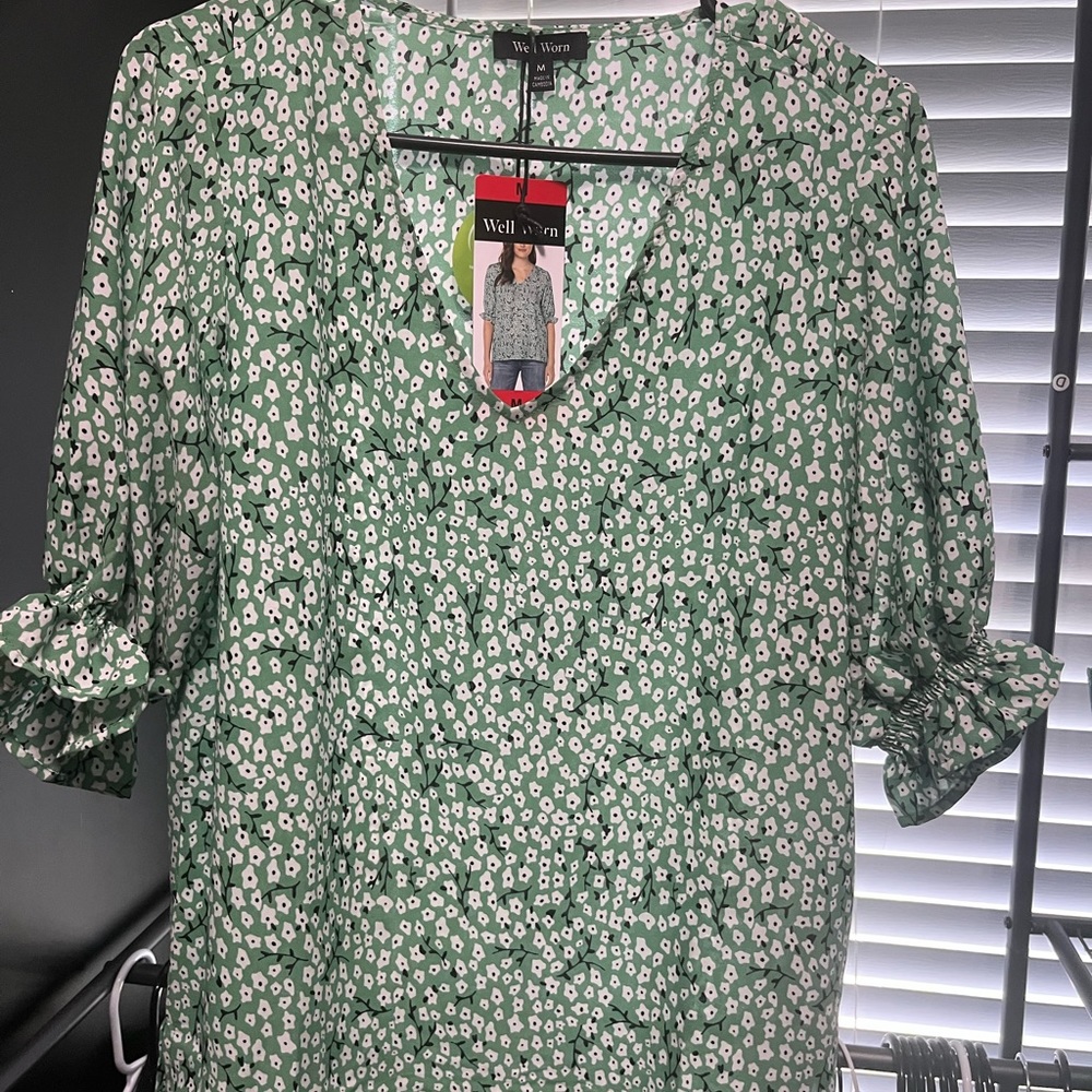 Green floral blouse